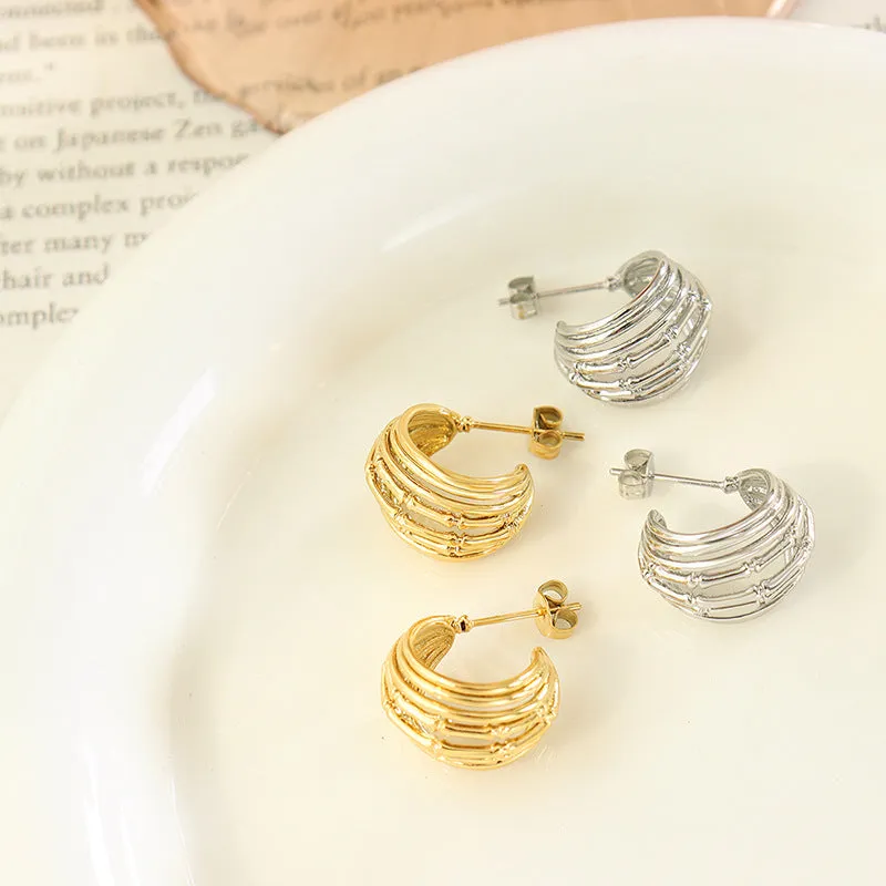 C-Shaped Brass Hollow Stud Earrings with Personalized Wind Design